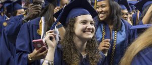 Photo of Students turning tassels at UNCG 2017 Spring Commencement